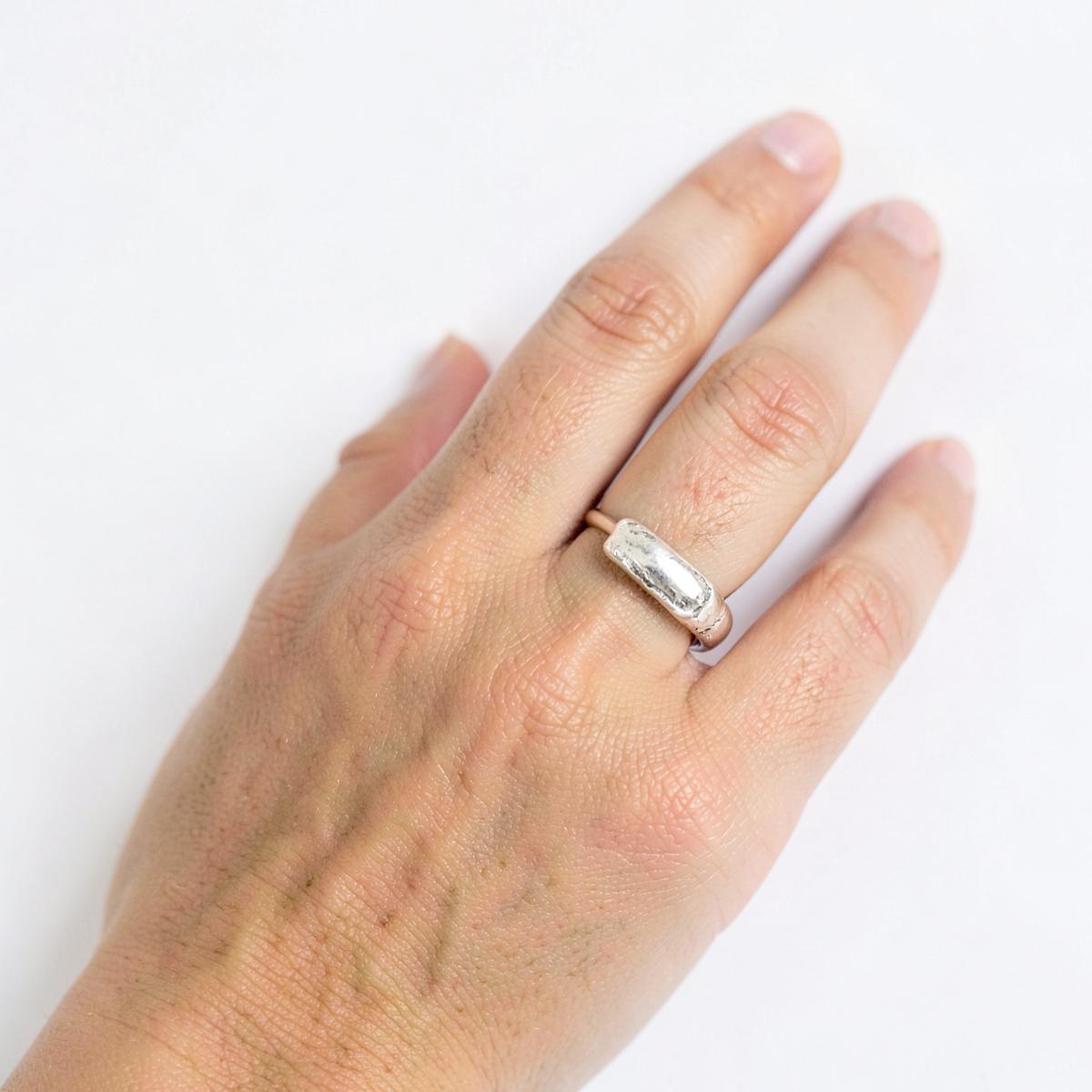 The Quarry Ring worn on a finger